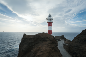 A picturesque lighthouse overlooking the sea in Tenerife.